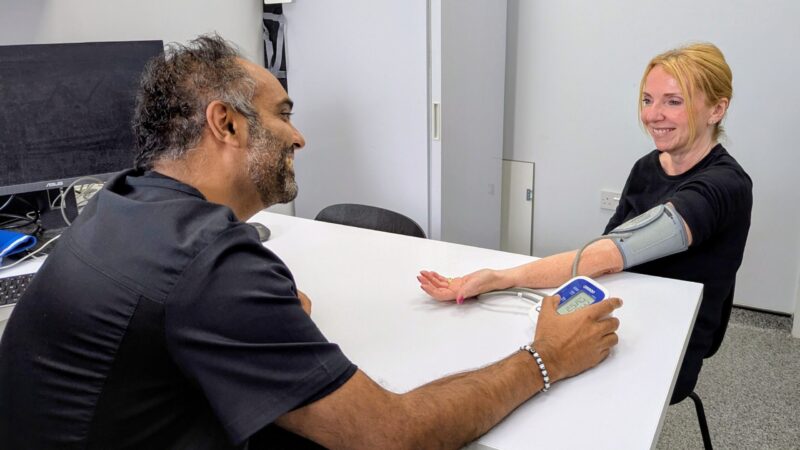 Pharmacist Bhavesh Patel with Sue Gallen at Audley Mills Pharmacy in Rayleigh