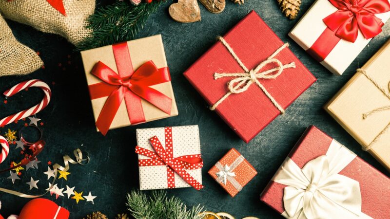 Lots of Christmas presents on dark background
